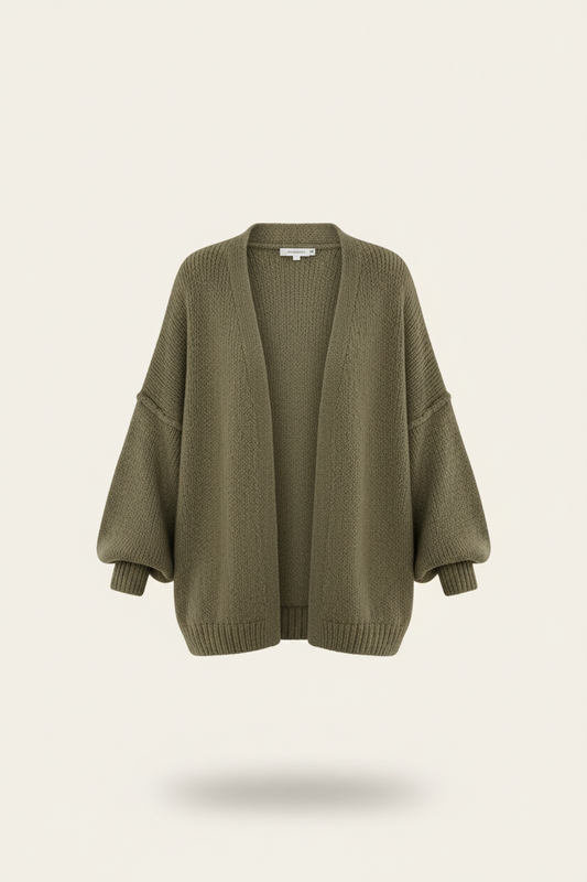 Olive oversized textured cardigan on a plain warm-white background