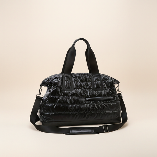 Waterproof duffel bag on a soft warm-ivory background